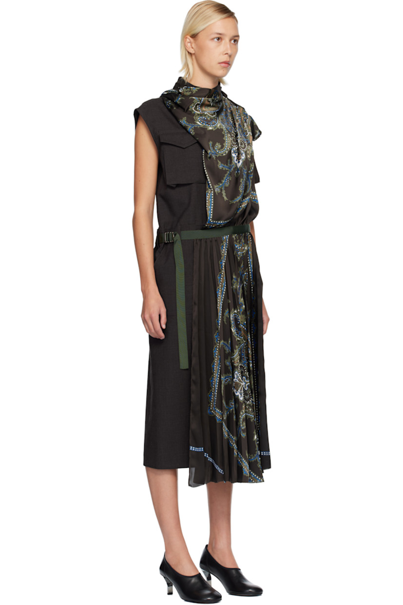 Plain-woven wool and satin midi dress. 

· Paneled wrap construction 
· Paisley pattern and pleats throughout 
· Mock neck
· Button closure
· Flap pocket at chest
· Belt loops and integrated cinch belt at waist
· Cap sleeves
· Two-pocket styling
· Central vent at back hem 

Supplier color: Brown/Khaki
