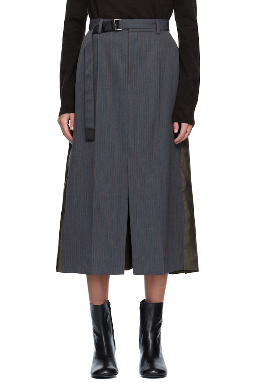 Wool-blend doeskin midi skirt. 

· Paneled wrap construction
· Striped throughout 
· Belt loops
· Integrated cinch belt at waistband
· Three-pocket styling
· Zip fly 
· Central vent at front hem 
· Pleated satin twill panel at back  

Supplier color: Gray/D/Khaki