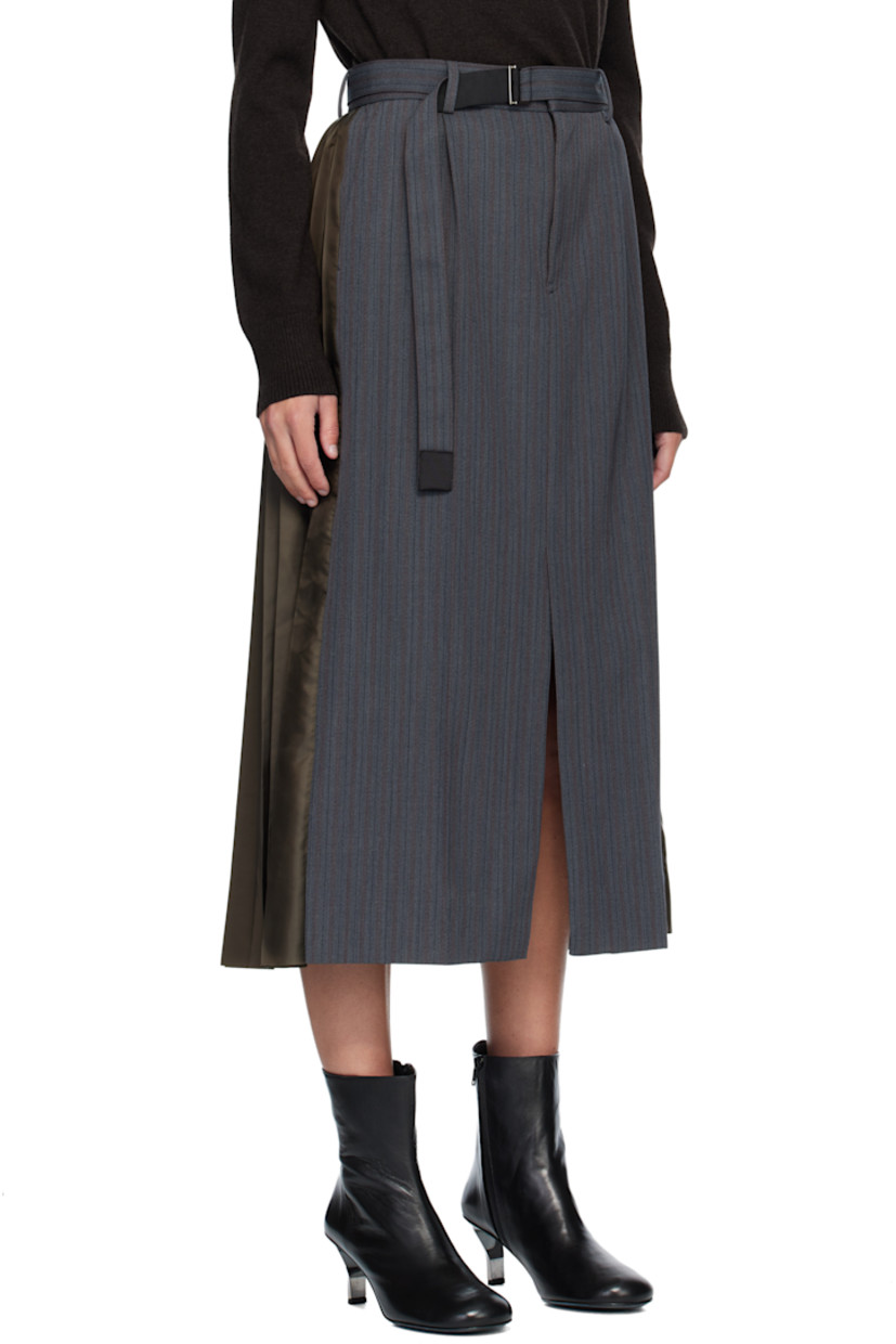 Wool-blend doeskin midi skirt. 

· Paneled wrap construction
· Striped throughout 
· Belt loops
· Integrated cinch belt at waistband
· Three-pocket styling
· Zip fly 
· Central vent at front hem 
· Pleated satin twill panel at back  

Supplier color: Gray/D/Khaki