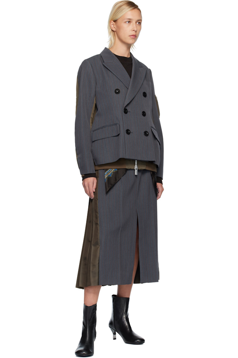 Wool-blend doeskin midi skirt. 

· Paneled wrap construction
· Striped throughout 
· Belt loops
· Integrated cinch belt at waistband
· Three-pocket styling
· Zip fly 
· Central vent at front hem 
· Pleated satin twill panel at back  

Supplier color: Gray/D/Khaki