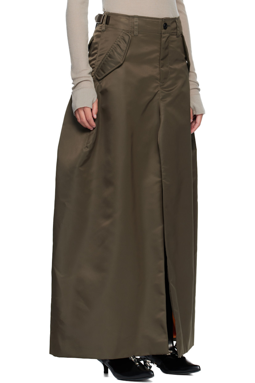 Nylon twill maxi skirt. 

· Belt loops
· Integrated cinch tabs at waistband 
· Four-pocket styling
· Zip fly 
· Cargo pocket at outseams 
· Central vent at front and back hem 

Supplier color: D/Khaki