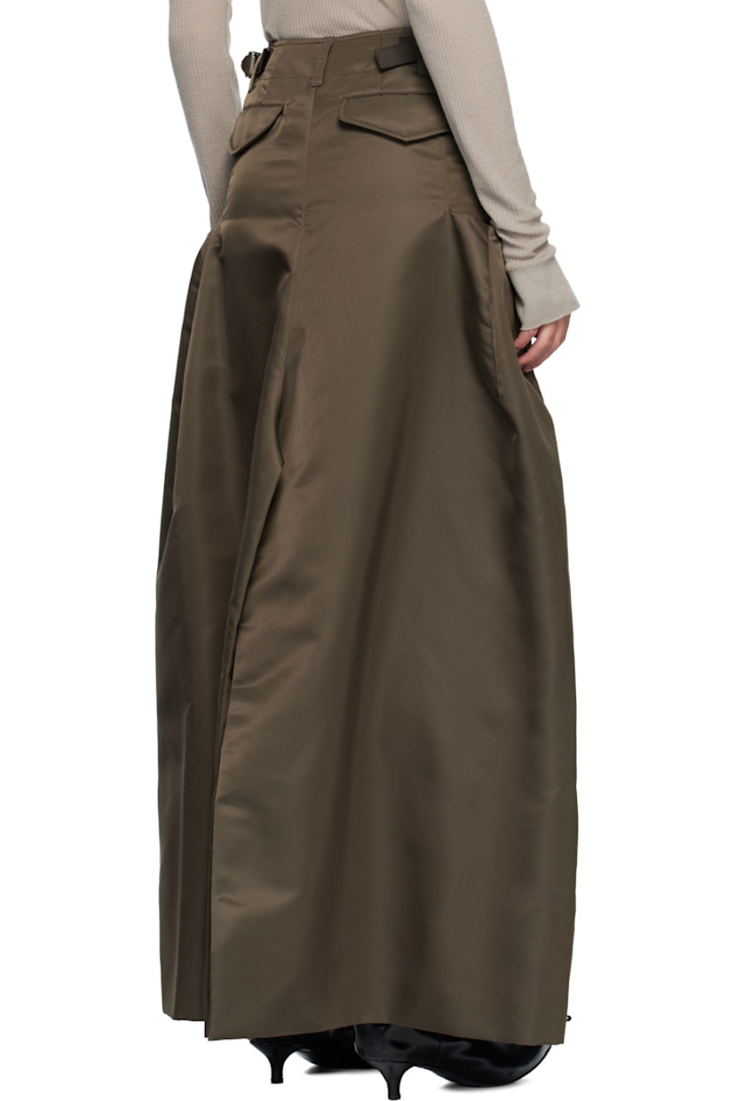 Nylon twill maxi skirt. 

· Belt loops
· Integrated cinch tabs at waistband 
· Four-pocket styling
· Zip fly 
· Cargo pocket at outseams 
· Central vent at front and back hem 

Supplier color: D/Khaki