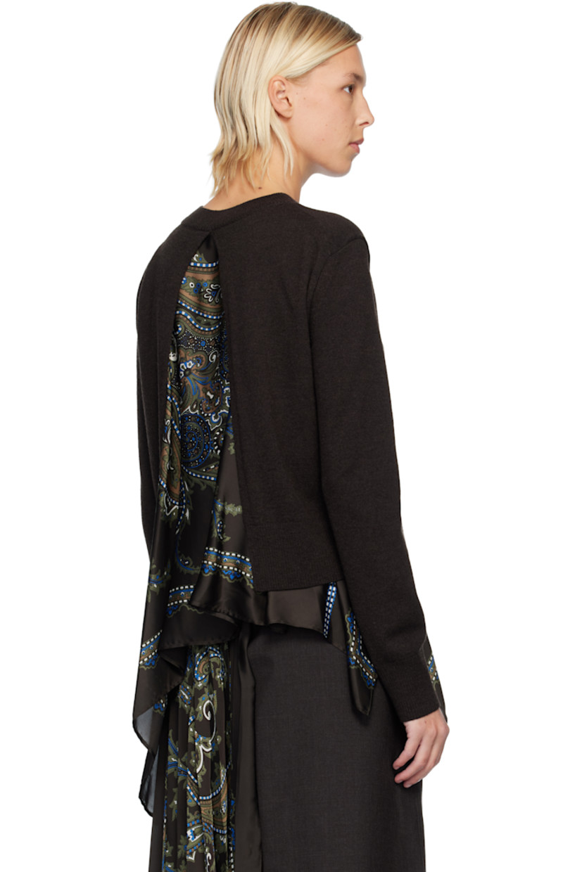 Knit wool sweater. 

· Paisley pattern printed at satin underlay 
· Rib-knit crewneck, hem, and cuffs
· Handkerchief hem
· Vent at back

Supplier color: Brown/Khaki