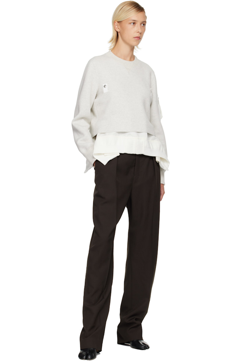 Heavyweight cotton-blend jersey sweatshirt. Integrated nylon satin underlay with rib-knit trim and vents at hem.

· Rib-knit crewneck and cuffs
· Press-stud tabs at chest
· Cropped hem
· Utility pocket at sleeve
· Partial mesh lining

Supplier color: Ecru/Off white