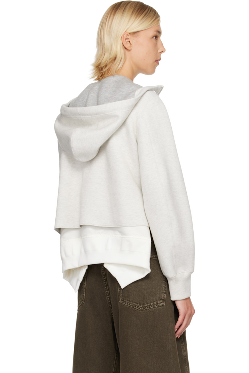 Heavyweight cotton-blend jersey hoodie. Integrated nylon satin underlay with rib-knit trim and vents at hem.

· Drawstring at hood
· Two-way zip closure
· Press-stud tabs at chest
· Welt pockets at waist
· Cropped hem
· Utility pocket at sleeve
· Rib-knit cuffs
· Partial mesh lining

Supplier color: Ecru/Off white
