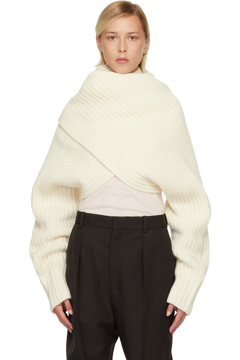 Rib-knit bolero-style turtleneck.

· Converts to wrap sweater
· Integrated hood
· Extended sleeves

Supplier color: Off white