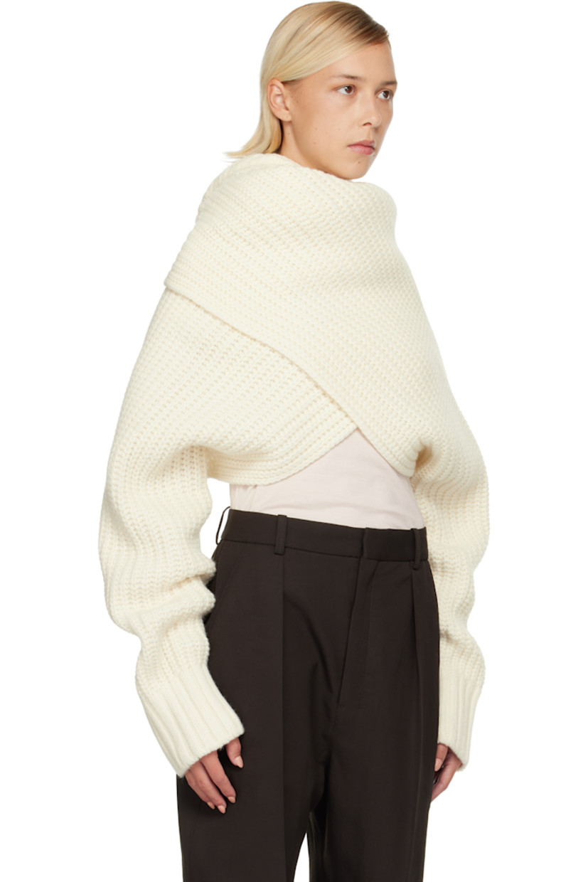 Rib-knit bolero-style turtleneck.

· Converts to wrap sweater
· Integrated hood
· Extended sleeves

Supplier color: Off white