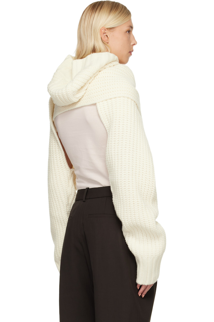 Rib-knit bolero-style turtleneck.

· Converts to wrap sweater
· Integrated hood
· Extended sleeves

Supplier color: Off white