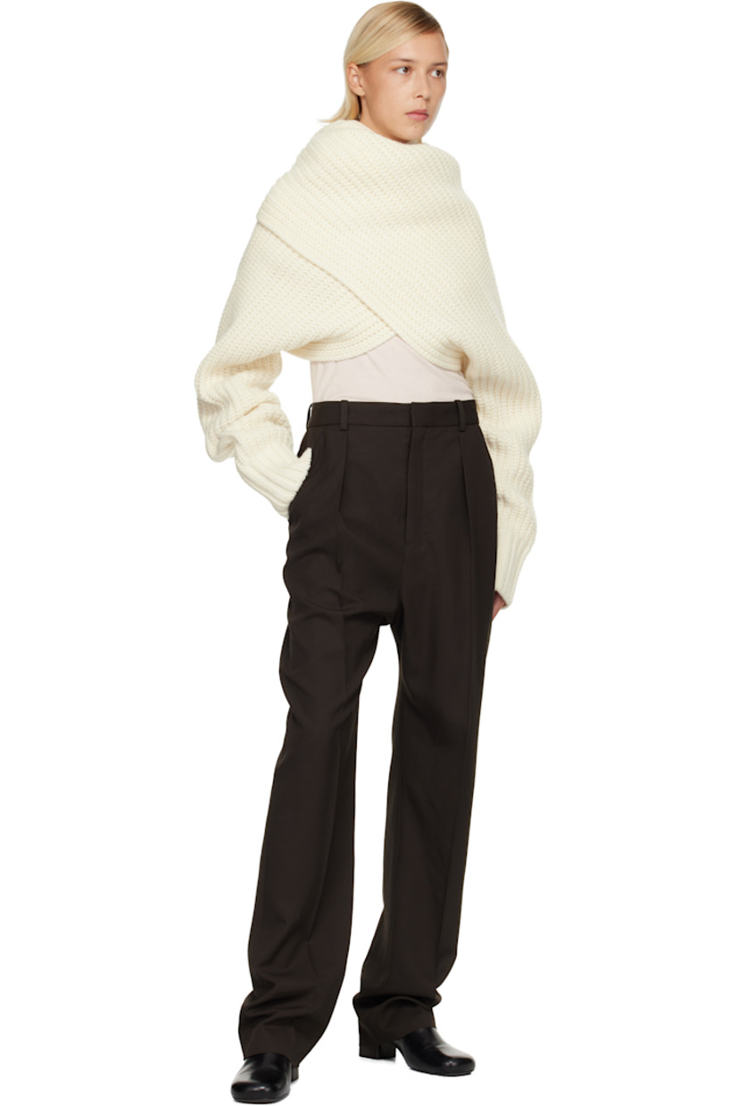 Rib-knit bolero-style turtleneck.

· Converts to wrap sweater
· Integrated hood
· Extended sleeves

Supplier color: Off white