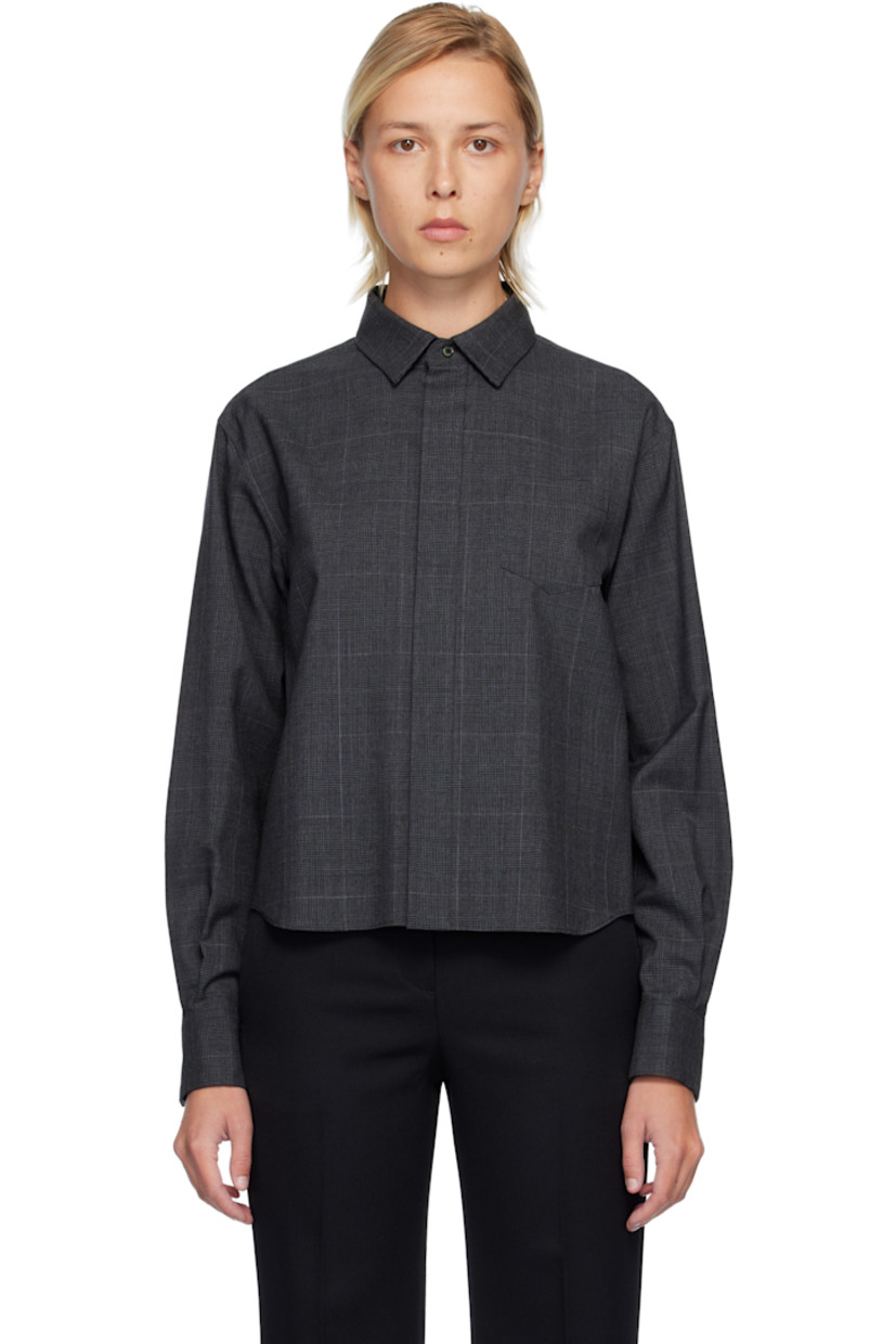 Plain-woven wool shirt. 

· Houndstooth pattern throughout 
· Spread collar 
· Button closure 
· Patch pocket at chest
· Pleats at buttoned barrel cuffs
· Pleats at chiffon back yoke 

Supplier color: Gray