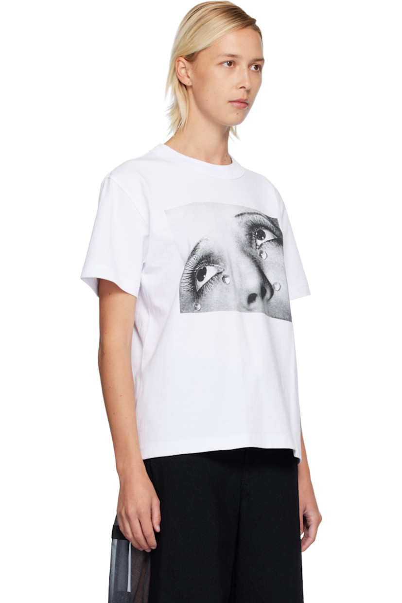 Cotton jersey T-shirt. 

· Rib-knit crewneck
· Graphic printed at front 
· Dropped shoulders
· Logo and text printed at back

Part of the Man Ray capsule. 

Supplier color: White