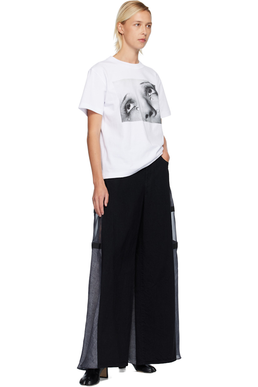 Cotton jersey T-shirt. 

· Rib-knit crewneck
· Graphic printed at front 
· Dropped shoulders
· Logo and text printed at back

Part of the Man Ray capsule. 

Supplier color: White