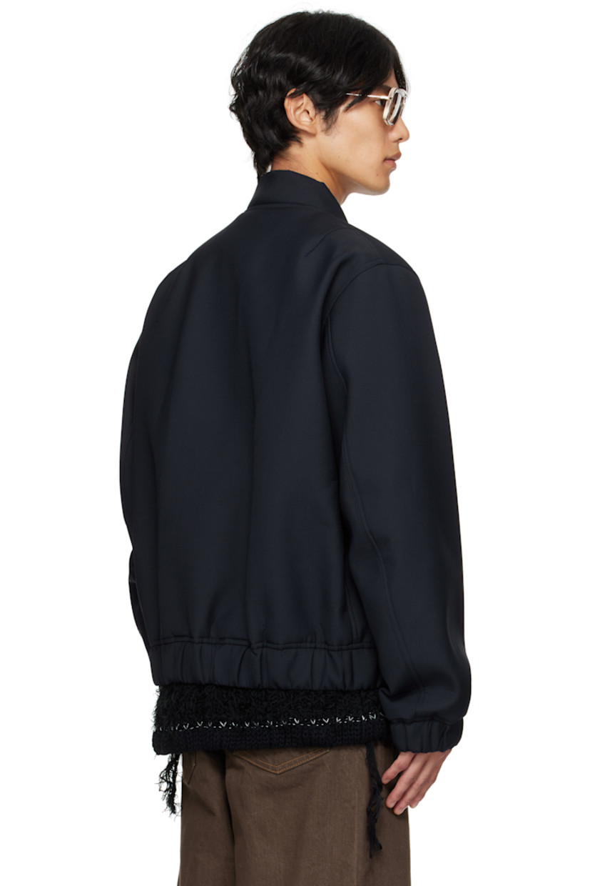 Insulated plain-woven wool-blend bomber jacket.

· Stand collar
· Offset two-way zip closure
· Press-stud tabs at chest
· Welt pockets at front
· Elasticized hem and cuffs
· Utility pocket at sleeve
· Full cupro satin lining

Supplier color: Navy
