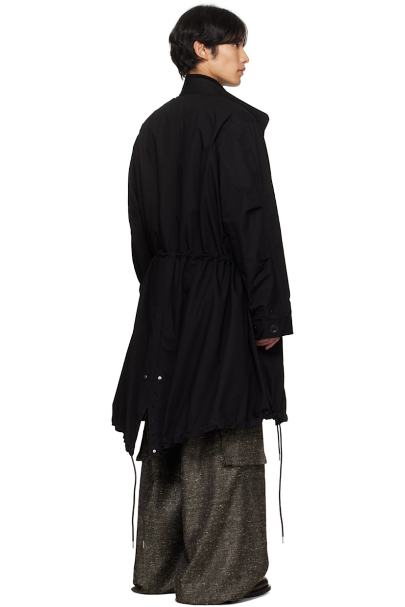 Padded cotton- and nylon-blend ripstop coat.

· Paneled construction 
· Stand collar with rib-knit underlay 
· Two-way zip closure and press-stud placket
· Webbing trim at chest
· Flap pockets at waist
· Drawstring at waist and hem 
· Rib-knit trim at hem 
· Utility pocket and pen slots at sleeve
· Button tab at cuffs
· Central vent at fishtail hem 
· Partial satin lining

Supplier color: Black