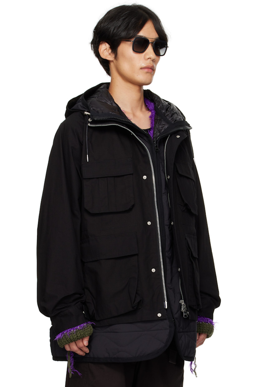Cotton- and nylon-blend ripstop jacket.

· Cord-lock drawstring at hood
· Funnel neck
· Two-way zip closure with press-stud placket
· Flap and patch pockets at front
· Raglan sleeves
· Adjustable press-stud tab at cuffs
· Zip vent at back
· Cord-lock drawstring at interior waist
· Integrated insulated and quilted liner
· Full satin lining

Supplier color: Black
