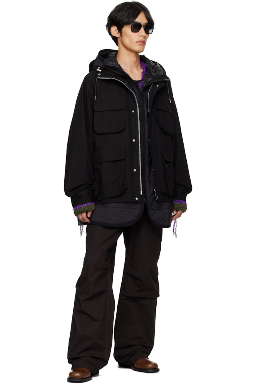 Cotton- and nylon-blend ripstop jacket.

· Cord-lock drawstring at hood
· Funnel neck
· Two-way zip closure with press-stud placket
· Flap and patch pockets at front
· Raglan sleeves
· Adjustable press-stud tab at cuffs
· Zip vent at back
· Cord-lock drawstring at interior waist
· Integrated insulated and quilted liner
· Full satin lining

Supplier color: Black