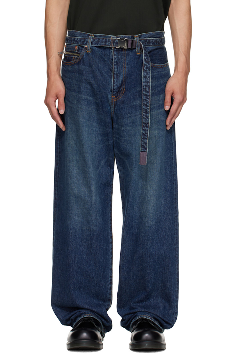 Non-stretch denim jeans.

· Fading and whiskering throughout
· Belt loops and detachable press-release belt
· Five-pocket styling
· Zip fly
· Leather logo patch at back waistband
· Logo-engraved silver- and copper-tone hardware
· Contrast stitching in tan

Supplier color: Blue