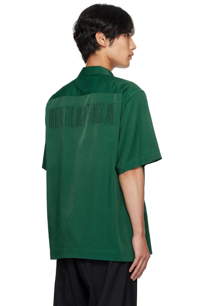 Rayon- and cotton-blend twill shirt.

· Spread collar
· Button closure
· Patch pockets and embroidered graphic at chest
· Vented side seams
· Text embroidered at back

Part of the Where The Wild Things Are capsule.

Supplier color: Green