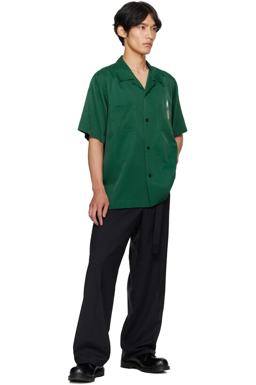 Rayon- and cotton-blend twill shirt.

· Spread collar
· Button closure
· Patch pockets and embroidered graphic at chest
· Vented side seams
· Text embroidered at back

Part of the Where The Wild Things Are capsule.

Supplier color: Green