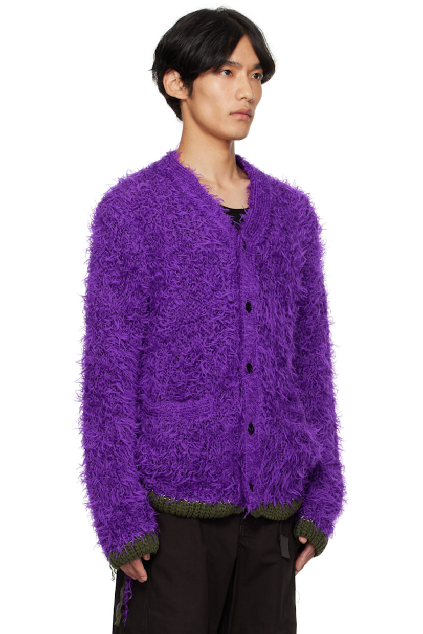 Shag-knit cardigan.

· Rib-knit Y-neck, hem, and cuffs
· Button closure
· Welt pockets at front
· Extended trim at hem and cuffs

Supplier color: Purple