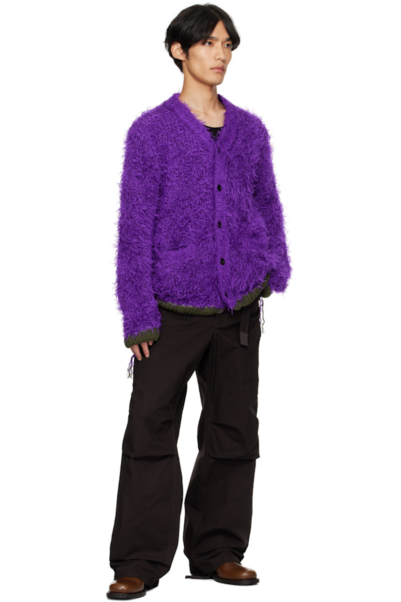 Shag-knit cardigan.

· Rib-knit Y-neck, hem, and cuffs
· Button closure
· Welt pockets at front
· Extended trim at hem and cuffs

Supplier color: Purple