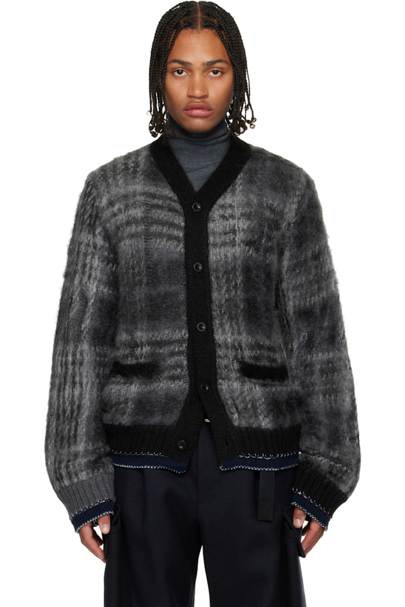 Brushed knit mohair-blend cardigan.

· Check pattern and distressing throughout
· Rib-knit Y-neck, hem, and cuffs
· Button closure
· Welt pockets at front
· Blanket stitching at hem and cuffs

Supplier color: Black