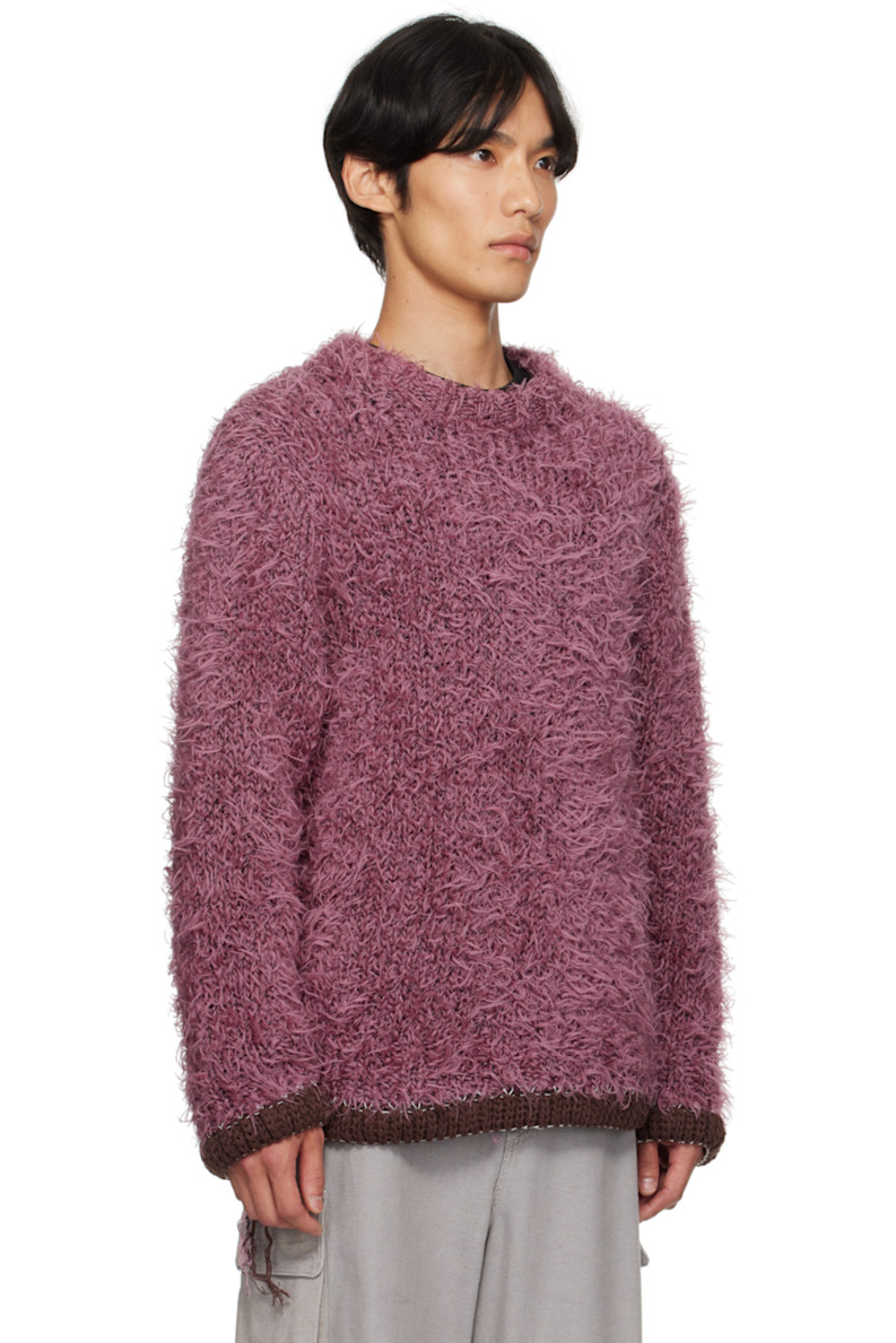 Shag-knit sweater. 

· Rib-knit crewneck, hem, and cuffs
· Loose thread detailing at side seams and cuffs
· Contrast stitching in white 

Supplier color: Pink
