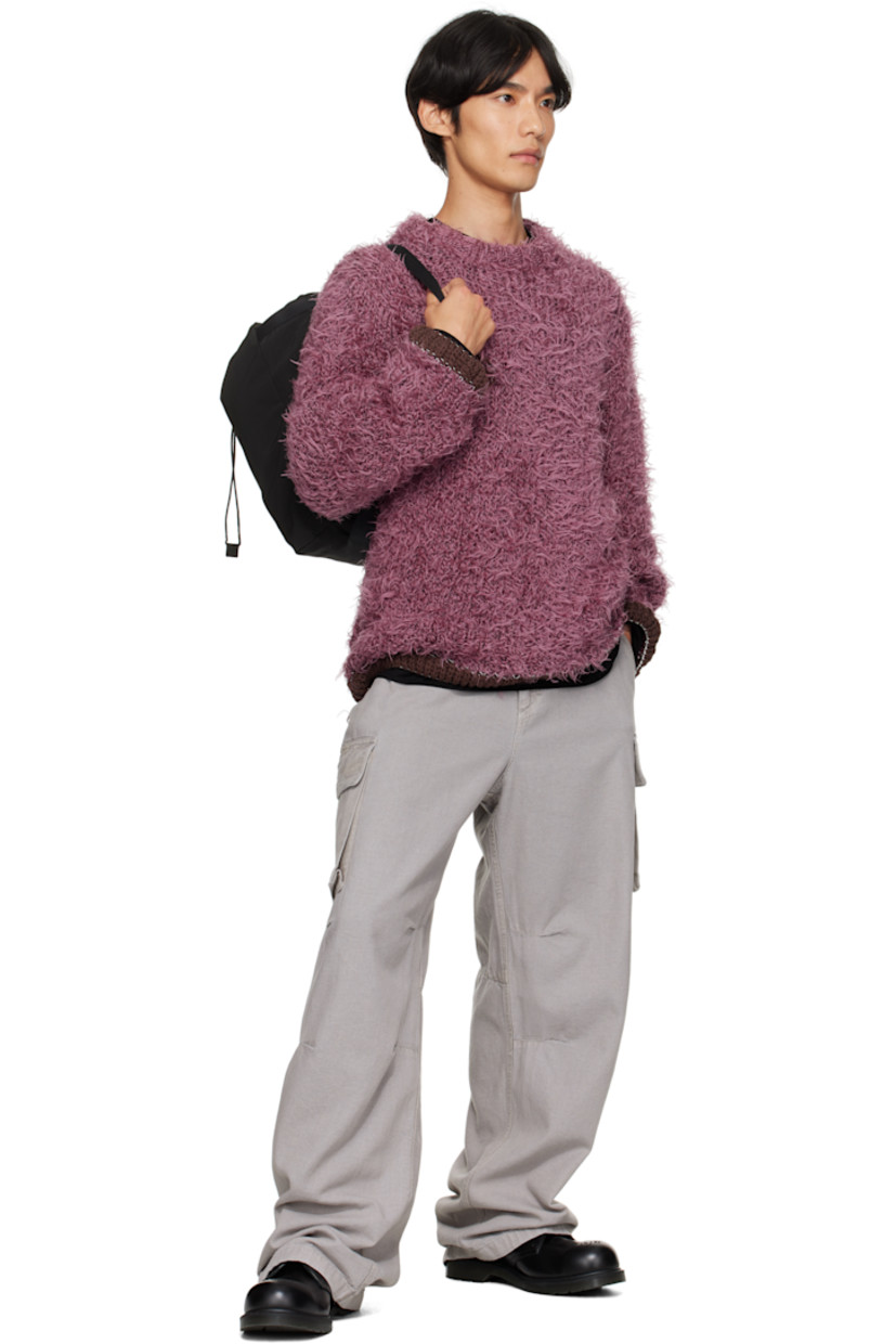 Shag-knit sweater. 

· Rib-knit crewneck, hem, and cuffs
· Loose thread detailing at side seams and cuffs
· Contrast stitching in white 

Supplier color: Pink