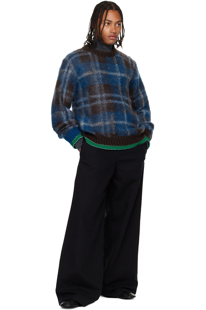 Brushed knit mohair-blend sweater. 

· Distressing and check pattern throughout 
· Rib-knit crewneck, hem, and cuffs
· Dropped shoulders 
· Blanket stitching at hem and cuffs

Supplier color: Brown/Blue