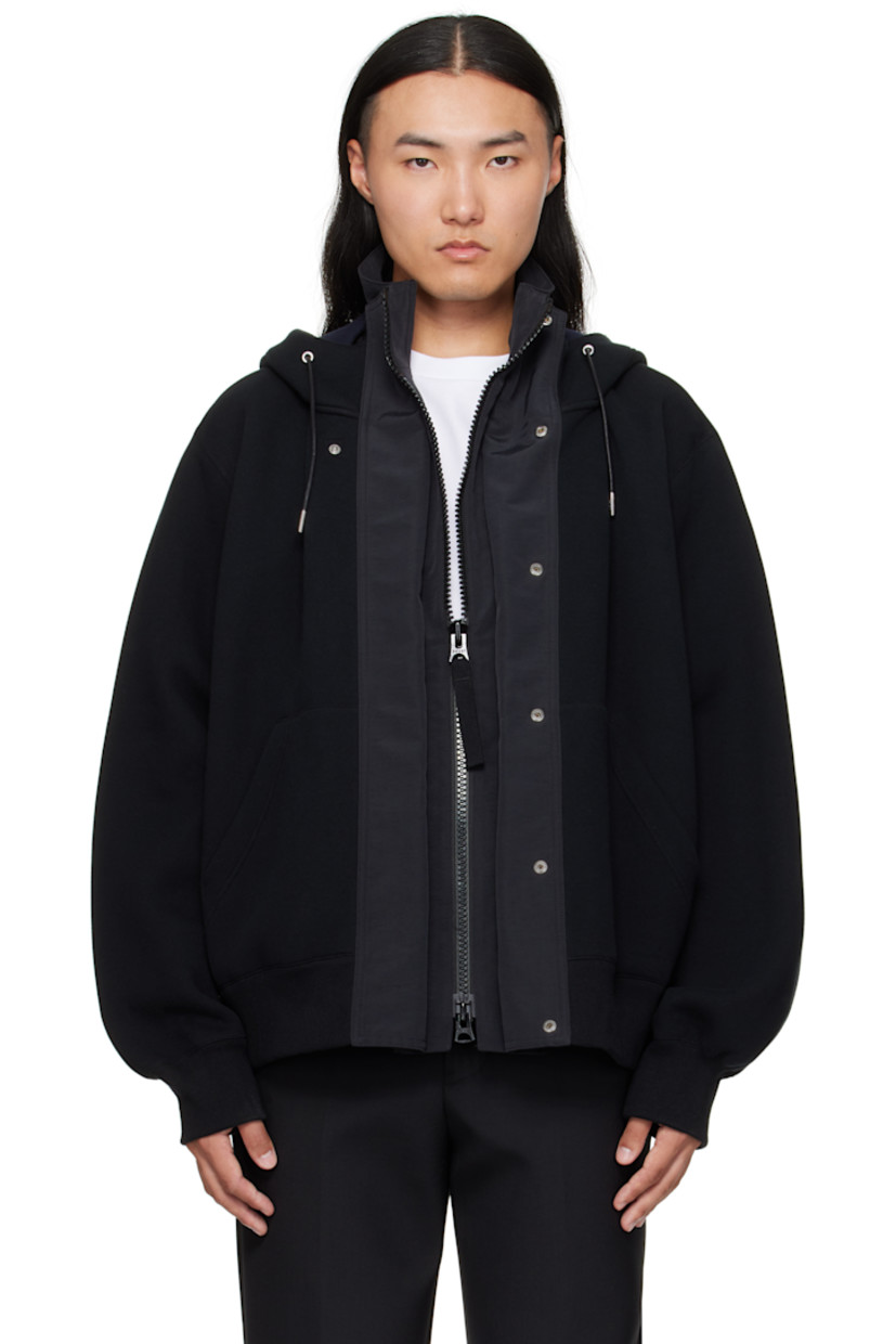 Double-faced cotton-blend fleece and grosgrain hoodie. 

· Paneled construction 
· Drawstring and stand collar at hood
· Concealed two-way zip closure
· Press-stud placket 
· Patch pockets at waist
· Rib-knit hem and cuffs 

Supplier color: Black