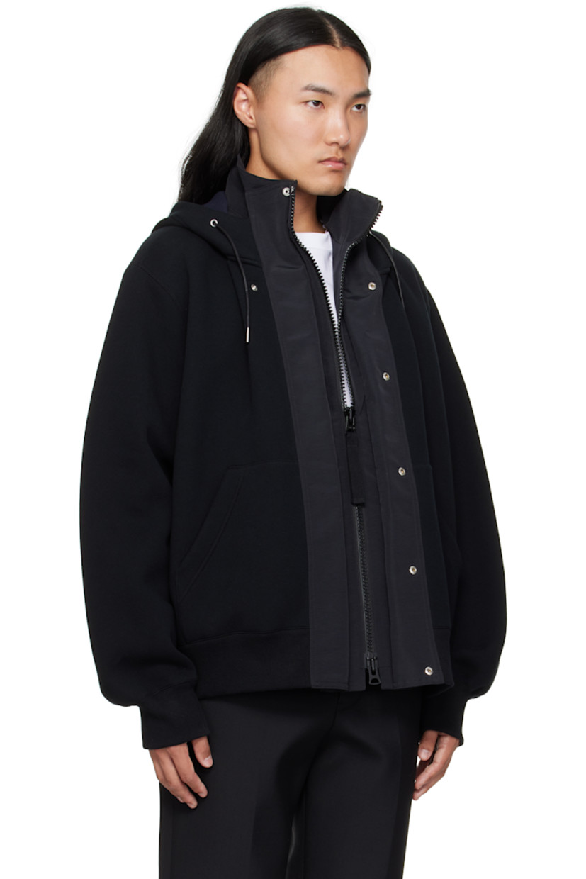 Double-faced cotton-blend fleece and grosgrain hoodie. 

· Paneled construction 
· Drawstring and stand collar at hood
· Concealed two-way zip closure
· Press-stud placket 
· Patch pockets at waist
· Rib-knit hem and cuffs 

Supplier color: Black