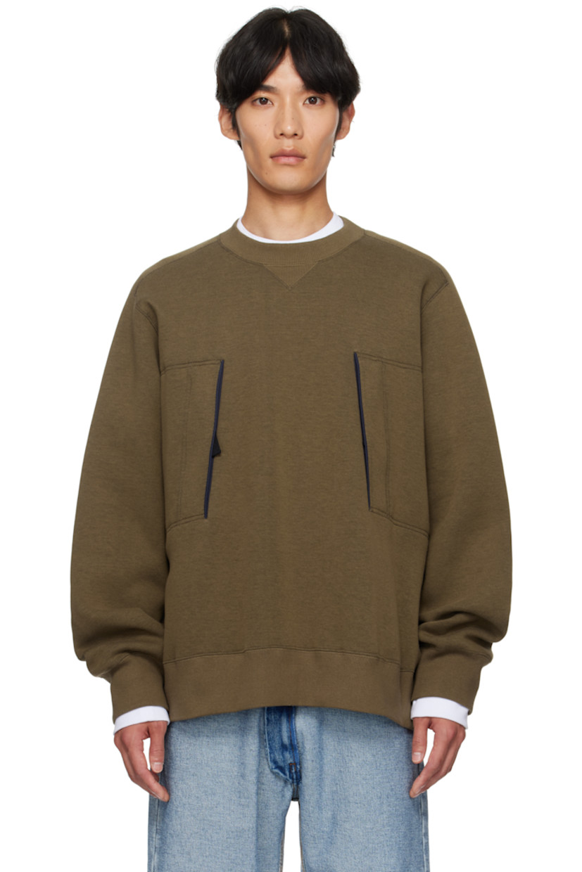 Double-faced cotton-blend jersey sweatshirt. 

· Rib-knit crewneck, hem, and cuffs
· Zip pockets at front 
· Grosgrain trim at pockets
· Saddle shoulders

Supplier color: Beige