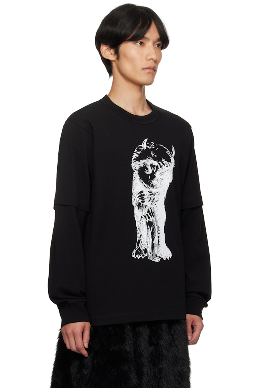 Cotton jersey T-shirt. 

· Rib-knit crewneck and cuffs
· Graphic printed at front 
· Layered sleeves 
· Logo and text printed at back 

Part of the Where The Wild Things Are capsule.
 
Supplier color: Black