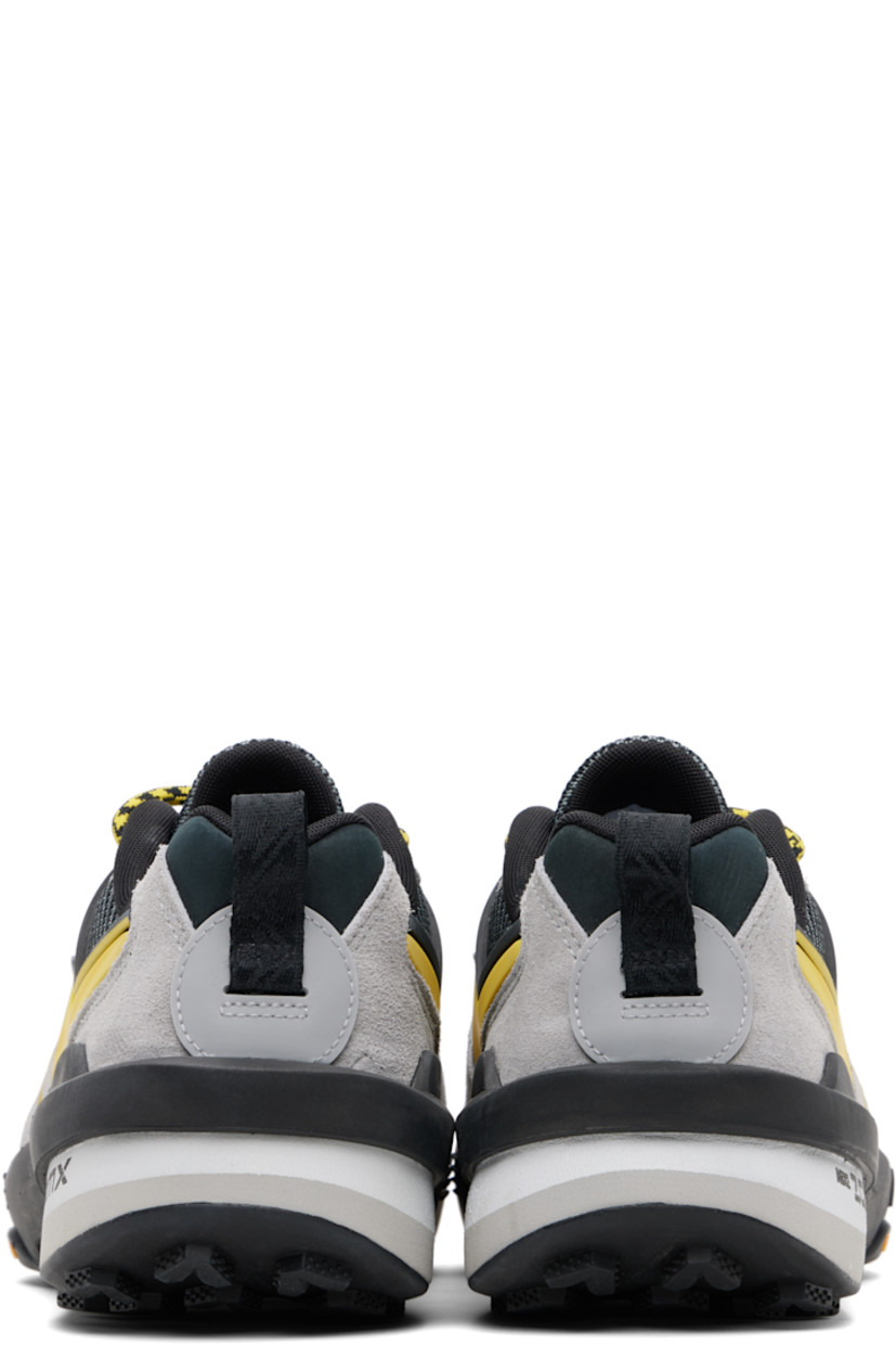 Low-top paneled leather, mesh, and suede sneakers.

· Rubberized trim throughout 
· Layered cord-lock lace-up closure
· Logo bonded at padded tongue
· Padded collar 
· Signature Swoosh appliqué at sides
· Pull-loop at heel tab 
· ZoomX foam rubber midsole
· Treaded Vibram® rubber sole 

Part of the Nike x sacai collaboration. 

Please note that this item may be shipped only within North America.

Supplier color: Matte silver/Tour yellow/Black