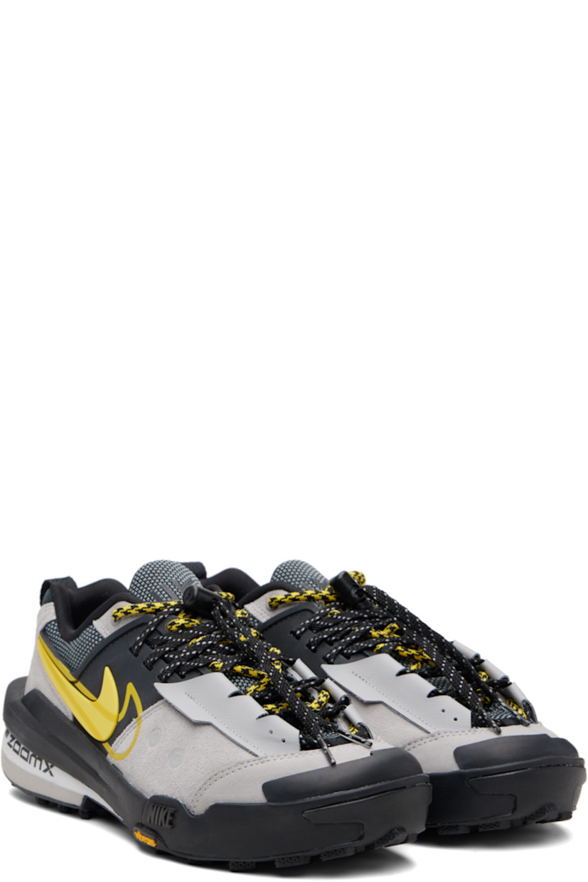 Low-top paneled leather, mesh, and suede sneakers.

· Rubberized trim throughout 
· Layered cord-lock lace-up closure
· Logo bonded at padded tongue
· Padded collar 
· Signature Swoosh appliqué at sides
· Pull-loop at heel tab 
· ZoomX foam rubber midsole
· Treaded Vibram® rubber sole 

Part of the Nike x sacai collaboration. 

Please note that this item may be shipped only within North America.

Supplier color: Matte silver/Tour yellow/Black