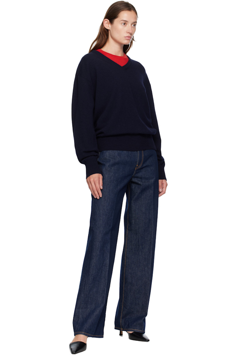 Non-stretch denim jeans. 

· Fading throughout
· Belt loops at navy denim waistband
· Five-pocket styling
· Zip fly
· Leather logo patch at back waistband
· Contrast stitching in tan

Supplier color: Raw rinsed