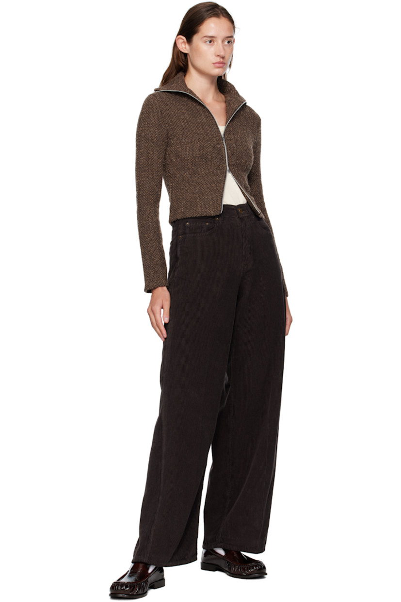 Cotton corduroy trousers.

· Belt loops
· Five-pocket styling
· Zip fly
· Logo patch at back waistband

Supplier color: Chocolate