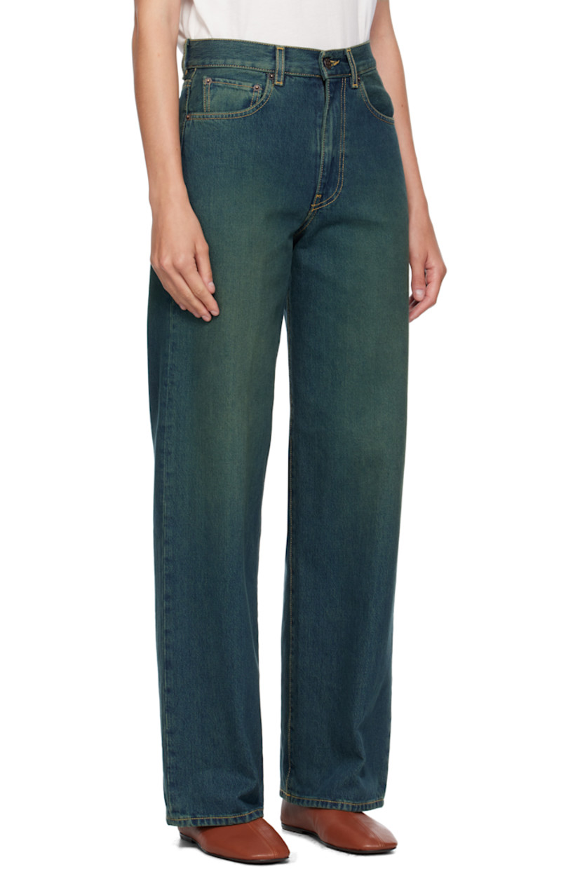 Non-stretch denim jeans.

· Fading throughout
· Wide-leg
· High-rise
· Belt loops
· Five-pocket styling
· Zip fly
· Logo patch at back waistband
· Contrast stitching in tan

Supplier color: Teal overdye