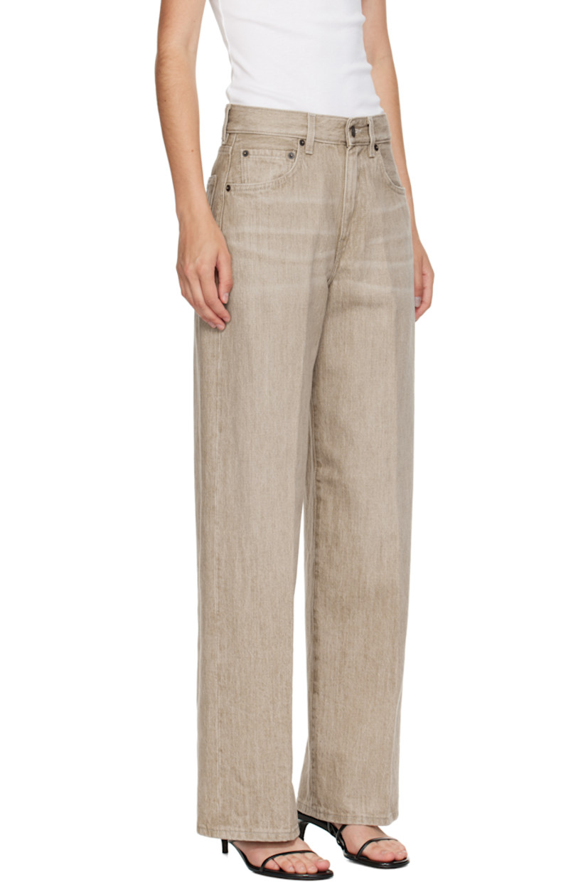 Wide straight-leg non-stretch denim jeans. 

· Fading and whiskering throughout 
· Mid-rise 
· Belt loops 
· Five-pocket styling
· Leather logo patch at back waistband 

Supplier color: Sanded quartz