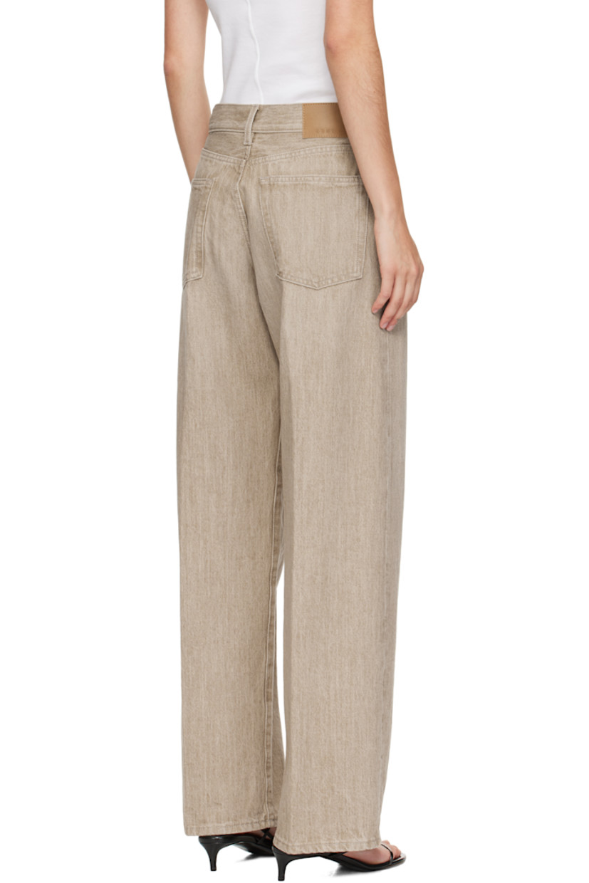Wide straight-leg non-stretch denim jeans. 

· Fading and whiskering throughout 
· Mid-rise 
· Belt loops 
· Five-pocket styling
· Leather logo patch at back waistband 

Supplier color: Sanded quartz