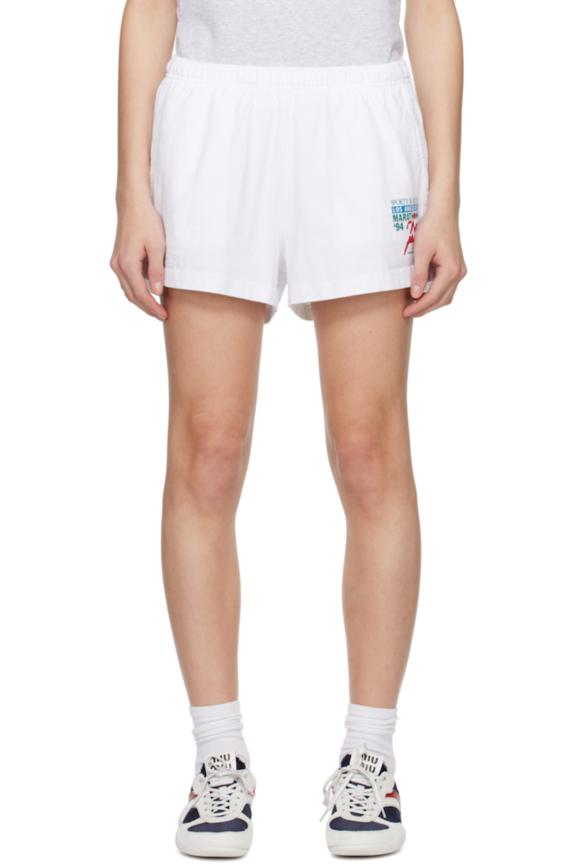 Heavyweight 9 oz cotton jersey shorts.

· Pre-shrunk and garment-dyed
· Concealed drawstring at elasticized waistband
· Three-pocket styling
· Logo, text, and graphic printed at cuff

Supplier color: White/Multi