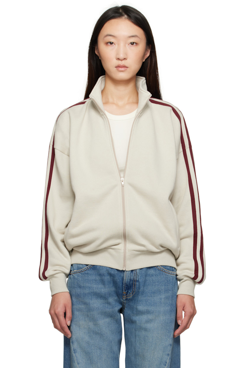 Cotton- and wool-blend fleece sweatshirt.

· Stand collar
· Zip closure
· Zip pockets at front
· Rib-knit hem and cuffs
· Dropped shoulders
· Stripes at sleeves

Supplier color: Putty