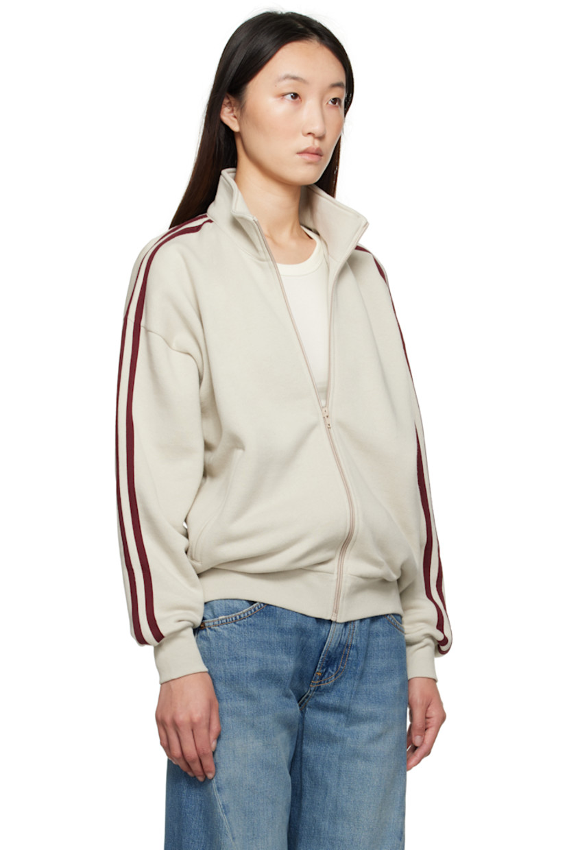 Cotton- and wool-blend fleece sweatshirt.

· Stand collar
· Zip closure
· Zip pockets at front
· Rib-knit hem and cuffs
· Dropped shoulders
· Stripes at sleeves

Supplier color: Putty