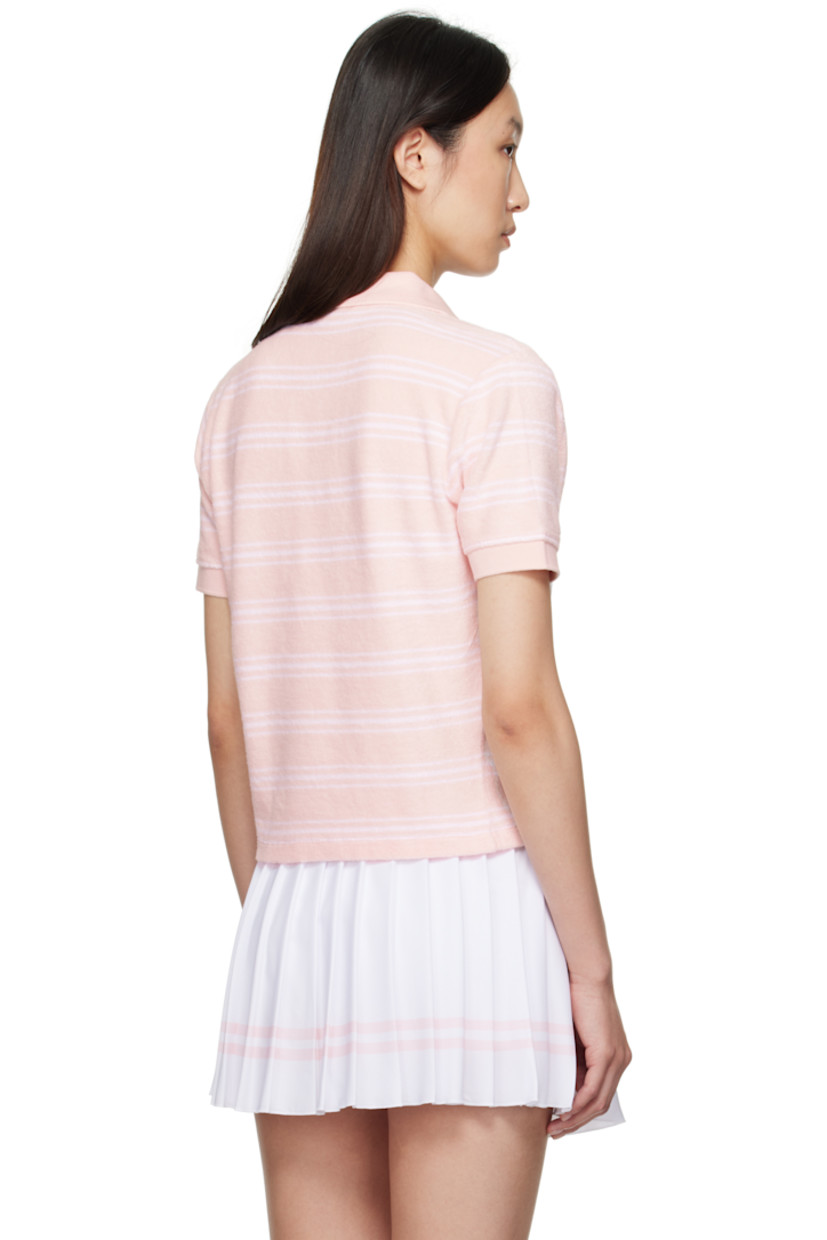 Garment-dyed cotton terrycloth polo. Striped throughout.

· Rib-knit spread collar, placket, and cuffs
· Open placket
· Logo embroidered at chest
· Cropped hem

Supplier color: Pink dolphin striped
