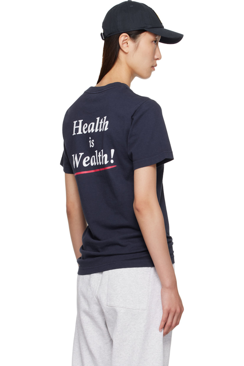 Garment-dyed cotton jersey T-shirt.

· Pre-shrunk
· Rib-knit crewneck
· Logo printed at chest
· Text printed at back

Supplier color: Navy/White/Fire Red