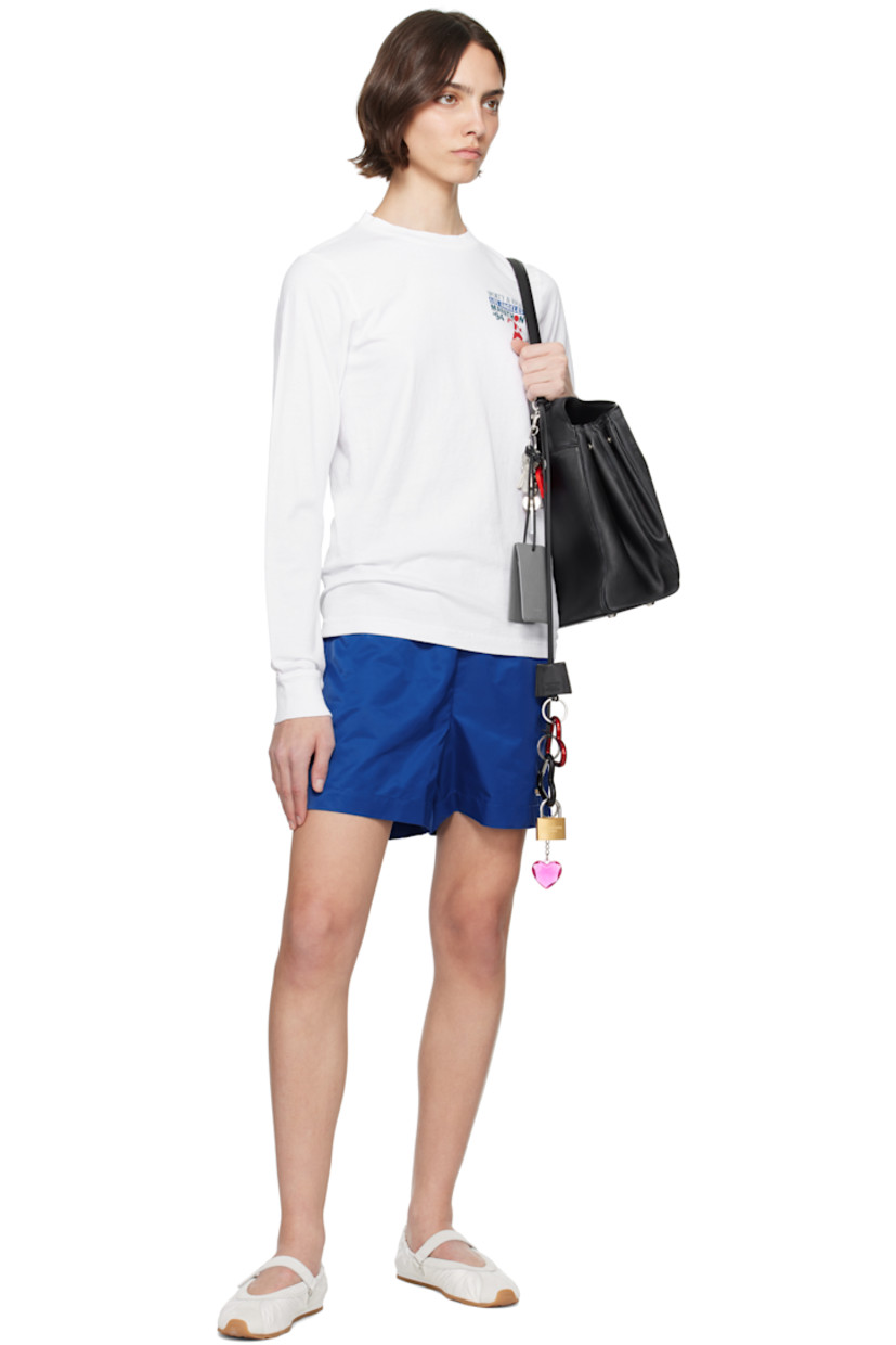 Garment-dyed 6.5 oz cotton jersey T-shirt.

· Pre-shrunk
· Rib-knit crewneck and cuffs
· Logo, text, and graphic printed at chest and back

Supplier color: White/Multi