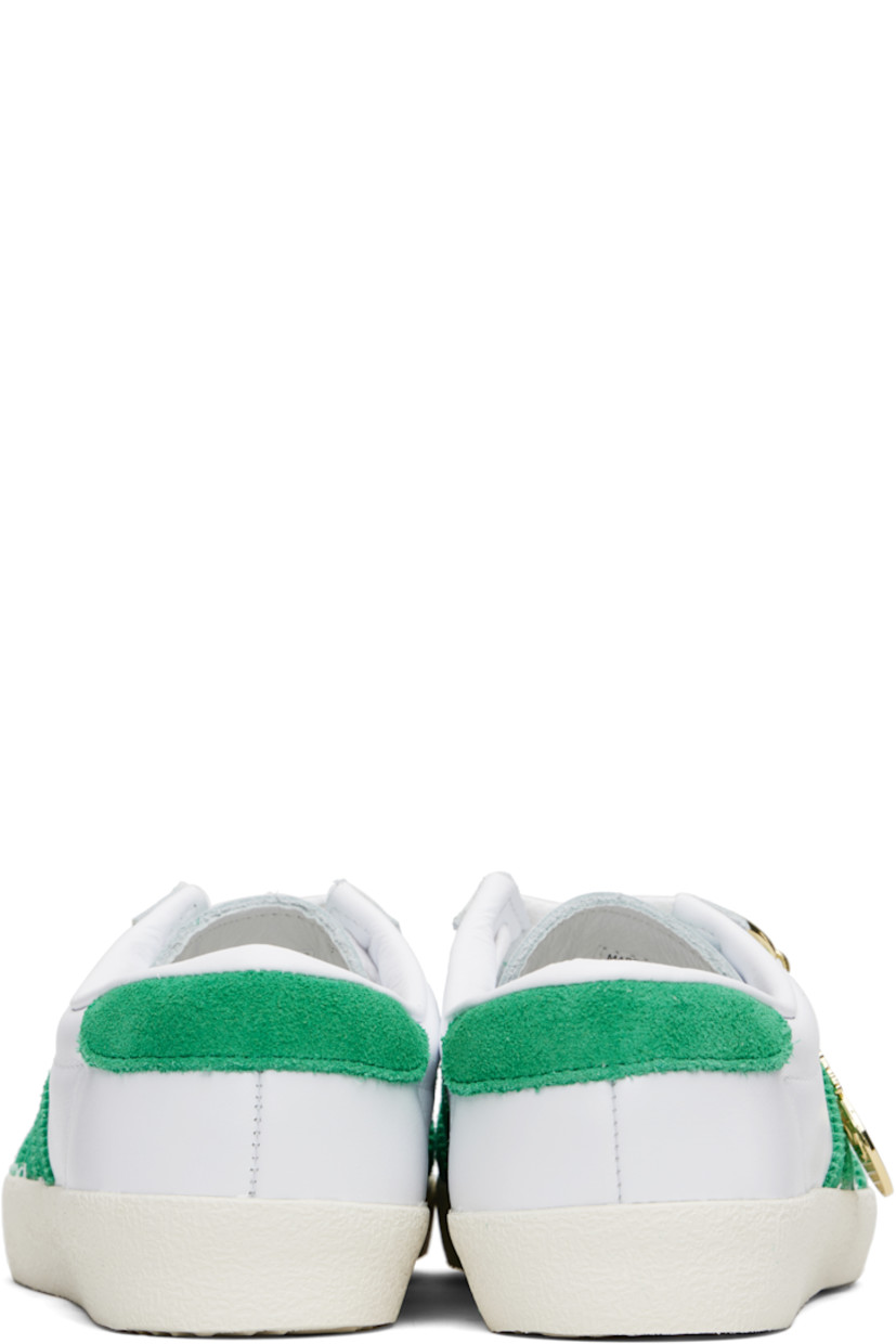Low-top buffed leather and suede sneakers. 

· Serrated edges throughout
· Lace-up closure
· Logo printed at tongue
· Padded collar
· Signature stripes at sides
· Logo stamp at outer side
· Treaded rubber sole

Part of the Sporty & Rich x adidas Originals collaboration.

Supplier color: Cloud white/Off white/Court green