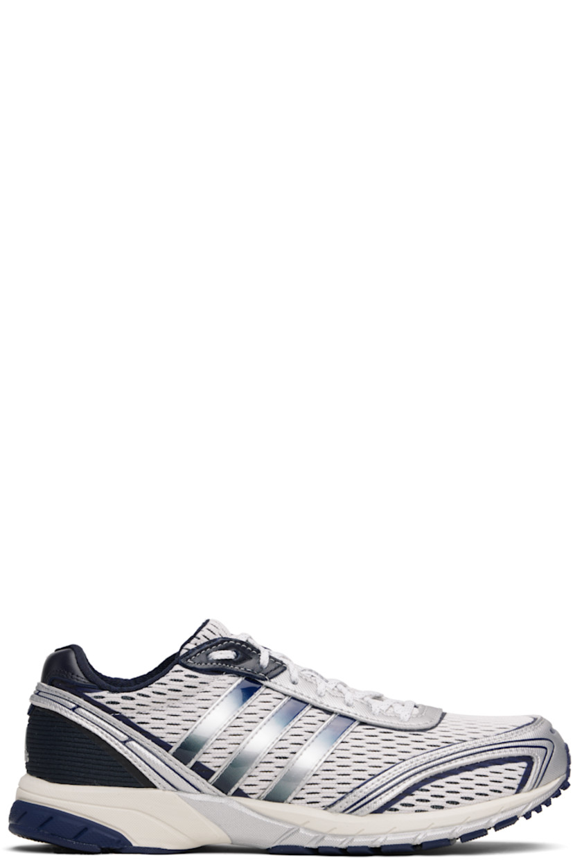 Low-top paneled mesh and buffed faux-leather sneakers.

· Lace-up closure
· Logo bonded at padded tongue 
· Padded collar
· Signature stripes at sides
· Logo bonded at heel counter
· Jersey lining
· Treaded rubber sole 

Part of the Sporty & Rich x adidas Originals collaboration.

Supplier color: Cloud white/Collegiate navy/Cloud white