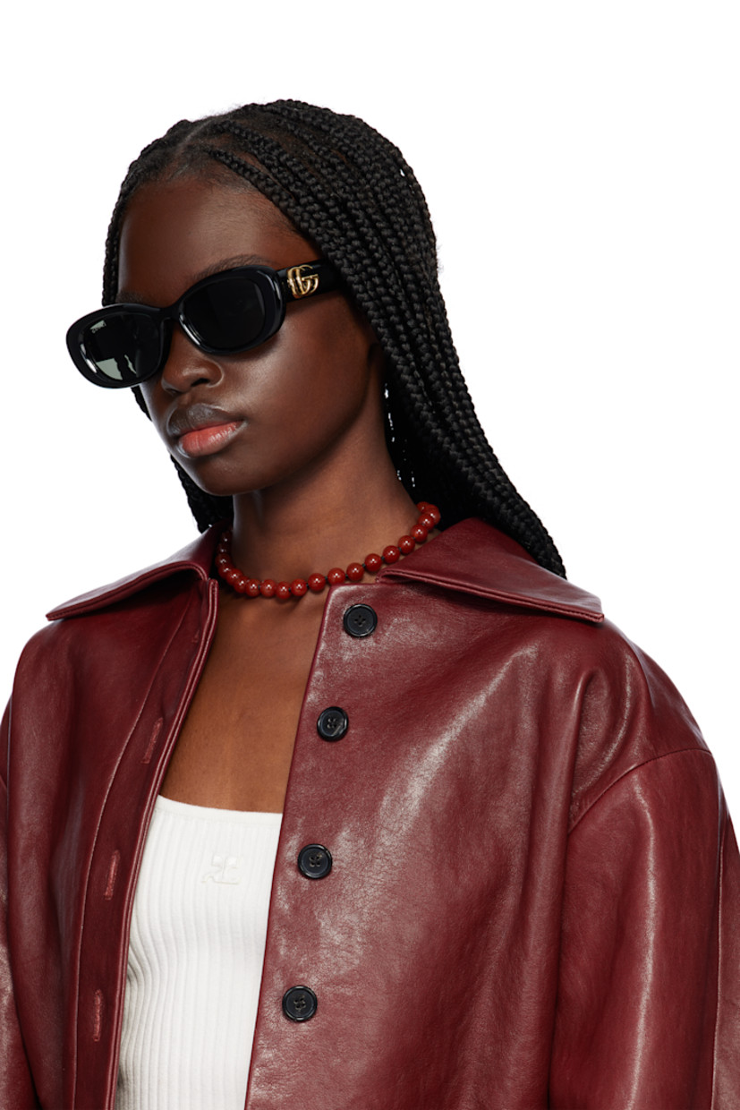 Oval acetate-frame sunglasses in black.

· Gray lenses
· 100% UVA/UVB protection, category 3
· Logo etched at lens
· Integrated nose pads
· Logo hardware at temples
· Includes pouch
· Size: 53.18 145

Supplier color: Black