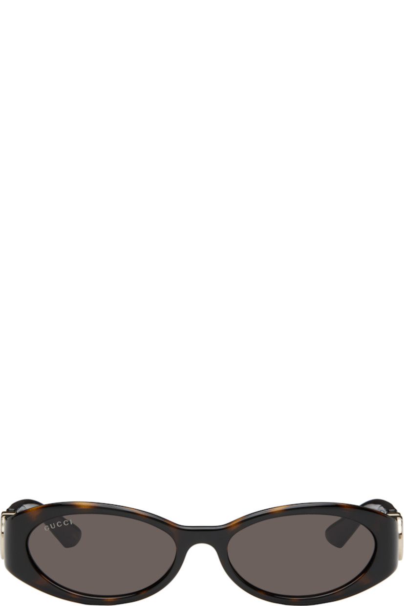 Oval tortoiseshell acetate-frame sunglasses in brown.

· Brown lenses, category 3
· 100% UVA/UVB protection
· Logo etched at lens
· Integrated nose pads
· Logo hardware and cutout at temples
· Includes case
· Size: 54.16 135

Supplier color: Tortoiseshell